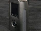 a small camera that is sitting on a table