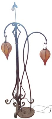 a lamp that is on top of a metal stand