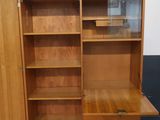 an image of a wooden cabinet in a room