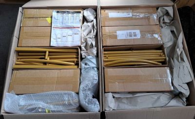 many boxes of boxes of cardboard sitting on a table