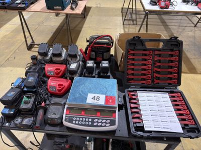 a table with many tools on it in a room
