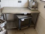 a kitchen with a stove, oven, and sink in it