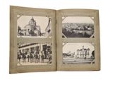 an old photo of a book with pictures of a town