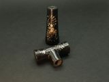 a small metal object that is sitting on a table