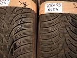 tire treads on the ground with price tags on them