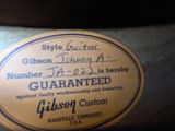 a label on the back of a hat that says gibson custom