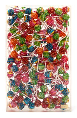 a close up of a bag of lollipops on a white background