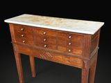 an image of a wooden chest of drawers with marble top