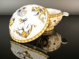 an image of a bowl with a lid on a table