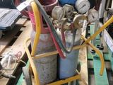 a stack of gas cans on a pallet in a warehouse
