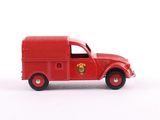 a red toy truck that is sitting on a white surface