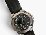 an image of a wrist watch with roman numerals on a black leather strap
