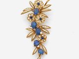 a sapphire and diamond broochle, by van cleef