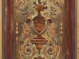 tableau représentant un vase avec des fleurs et des bougies, dans un cadre en bois