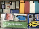 a box full of assorted toy cars and other items
