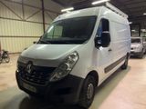 a white van that is parked inside of a building