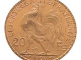 l'image d'une pièce d'or ornée d'un coq