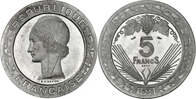 a close up of a coin with a woman ' s face on it