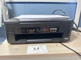 a printer that is sitting on top of a desk
