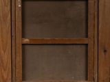 a picture of an old wooden window with some stickers on it