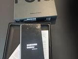 a box with a phone inside of it sitting on a table