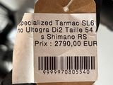 a tag that says specialized tarmac sl6 no ultegra diz taille 54 $ $ $ $ $ $ $ $ $ $ $