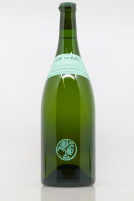 a bottle of wine that is sitting on a table