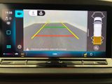 a picture of a car ' s rear view camera on the dashboard