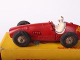a toy car that is sitting on top of a box