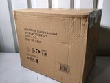 a box that is sitting on a table near a radiator