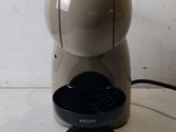 a coffee maker that is sitting on a table