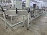 a machine that is working on a conveyor belt in a factory