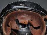 a close up of a helmet on a table