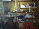a room filled with lots of clutter and tools