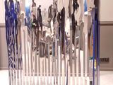 a display of skis and ski poles on a table