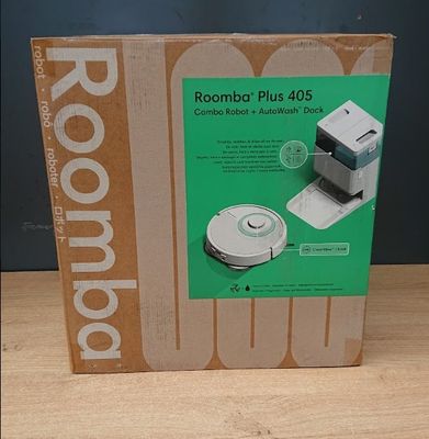 une boîte sur laquelle est représenté un robot, posée sur une table