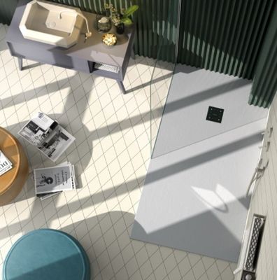 overhead view of a bathroom with a toilet, sink, and mirror