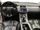 the interior of a car with a steering wheel, dashboard, and dashboard controls