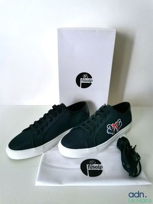 men ' s black leather sneakers with white soles and a white box