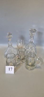 a number of glass items on a table next to each other