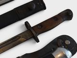 several different types of knives are displayed on a white surface