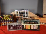 a lot of bottles and boxes of liquor on a table