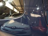 a reflection of a car in the side mirror of a car