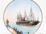 a plate with a painting of a ship on it