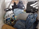 a box full of clothes and other items that are in it