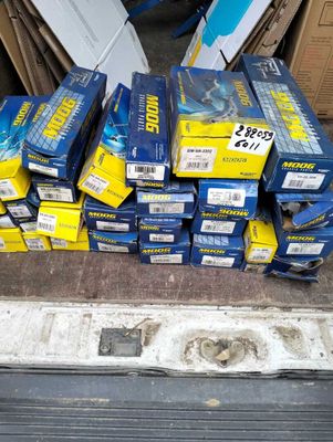 many boxes of blue and yellow items on the ground