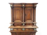 an image of a wooden cabinet with two doors on top of it