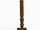 an image of a wooden pedestal with a wooden top