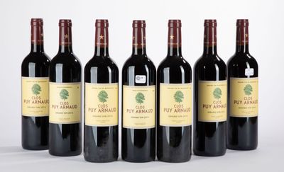 six bouteilles de vin rouge sont alignées