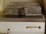 a machine that is sitting in the corner of a room